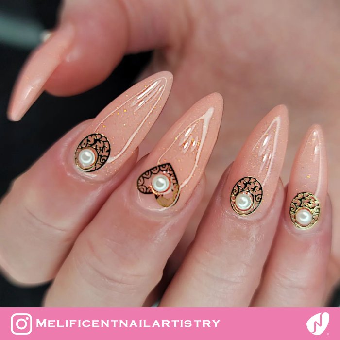 Pearl Design on Pink Almond Nails